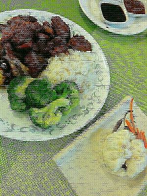 The faux pork and duck with rice and a steamed bun at Peaceful Loft in St Johns