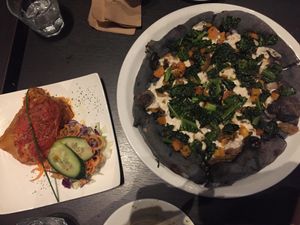 Charcoal base pizza and small lasagne portion at FED by Water in East London