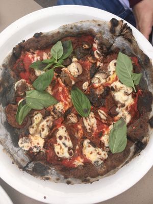 Black pizza boscaiola at FED by Water in East London