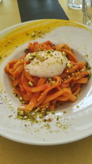 Pasta pomodoro e stracchino vegetale at Selezione Naturale in Turin