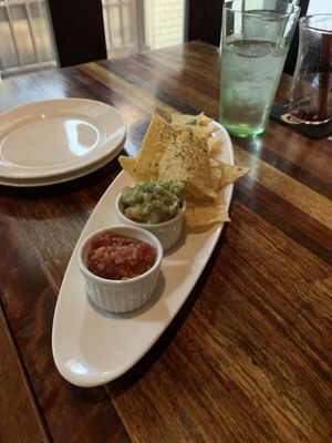 Corn chips and salsa/guacamole appetizer  at The Blackstock in Osaka