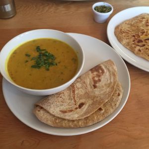 Red lentil daal with roti and parantha. at Ranjit's Kitchen in Glasgow