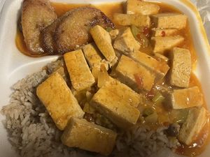 The BEST Caribbean Vegan Dish I’ve ever had. Pigeon peas, brown stew Tofu and Plantains. Chef’s Kiss 💖  at Red Stripes Caribbean Cuisine and Lounge in Bluffton