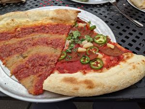 Vegan pizza by the slice at Sizzle Pie - W Burnside in Portland