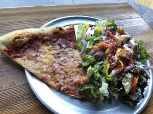 Void (vegan cheese pizza) with the rabbits salad. $8 at Sizzle Pie - W Burnside in Portland