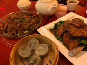 tofu skin in cedar sauce, dumplings and pepper "chicken". at Bodhi Kosher Vegetarian Restaurant in New York City