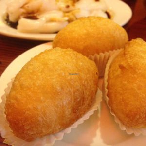 fried sticky rice, shrimp rice rolls in back at Bodhi Kosher Vegetarian Restaurant in New York City