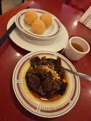 Szechuan beef and sesame balls at Bodhi Kosher Vegetarian Restaurant in New York City