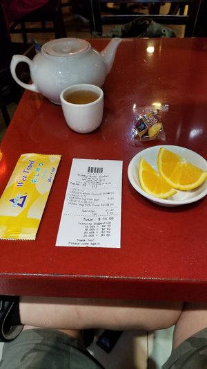 After dinner: orange slices, fortune cookie, and more hot tea! at Bodhi Kosher Vegetarian Restaurant in New York City