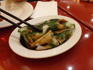 Spinach noodle cake thing at Bodhi Kosher Vegetarian Restaurant in New York City
