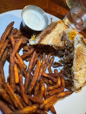 Seitan Texas Cheesesteak with sweet potato fries and vegan ranch   at The Top in Gainesville