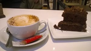chocolate cake and vegan cappucino at Loving Hut - North Laine in Brighton