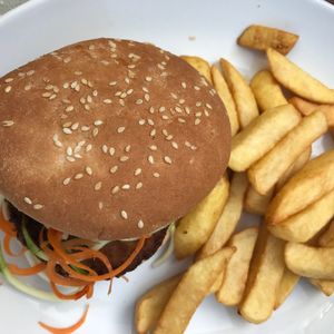 spicy burger and chips  at Loving Hut - North Laine in Brighton