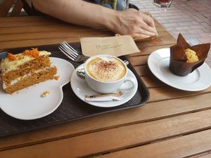 Carrot cake, coffee (cappuccino) and a lemon muffin at Loving Hut - North Laine in Brighton