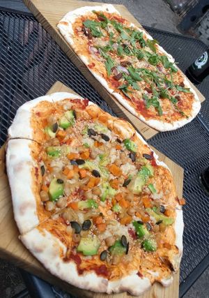 Pizzas in the garden of pizza lab at Pizza LAB in Leipzig