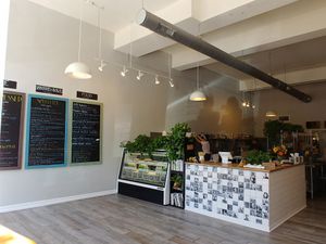 Front, seating to the right at Pulp + Sprout Juice Bar and Vegan Cafe in Asheville