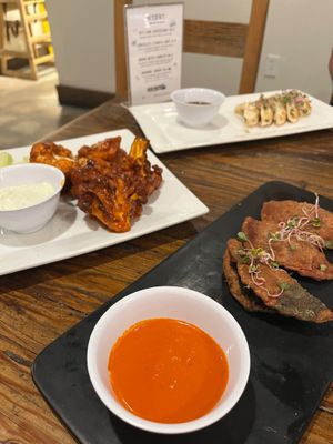 Dumplings, buffalo cauliflower wings and the empanadas. Each with an in house made from scratch sauce that was fingerlicking good.  at VegeNation in Las Vegas