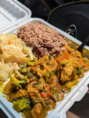 Vegan Curry Chicken, cabbage with rice and beans at Tashes Ankh in Randallstown