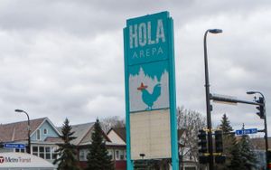 sign on corner at Hola Arepa in Minneapolis
