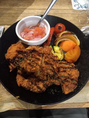 Thick-cut plant-based cutlets with veg and tomato and balsamic relish at The Restaurant at U2 in Onomichi