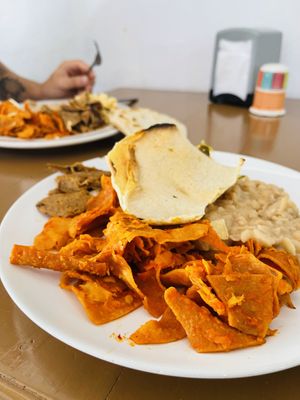 Chilaquiles with beans and tortillas (breakfast)  at Mary Restaurant Vegetariano in Puerto Vallarta