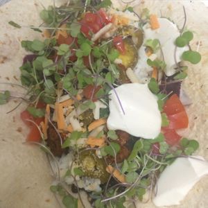 vegan taco with seitan Mexican chipotle sausage and vegan sour cream and cheese   at Planet Yum in Vero Beach