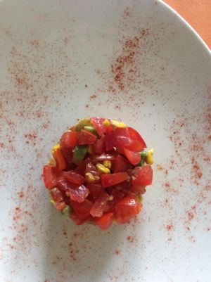 Tartare di pomodori avocado e mais. at Equilibrio in La Spezia