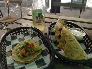 Al pastor quesadilla and guacamole taco at Momencik in Warsaw