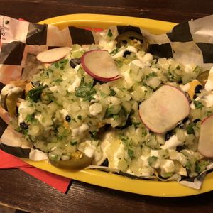 Guac nachos (it’s all underneath don’t be fooled!)  at Momencik in Warsaw