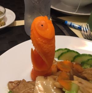  detailed fish carved in a carrot at Vegesana & One Ramen in Barcelona