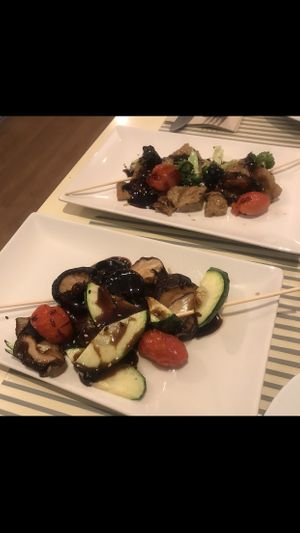 Top- seitan and broccoli in a hoisin sauce, and bottom - shiitake mushrooms in a tasty hoisin sauce  at Vegesana & One Ramen in Barcelona