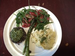 Main dish : grilled greens, black beans burger with pesto, mashed potatoes, asparagus, cherry tomatoes salad (Vegan) at Robin Food in Amsterdam