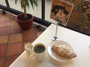 Almond croissant & coffee  at The Lunch Room Bakery & Cafe in Ann Arbor