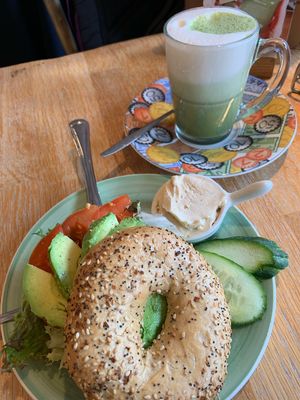 Avocado everything bagel with a vegan matcha latte at Bagels & Beans in Zoetermeer