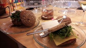 seitan sandwich and veggie burger  at La Camelia Vegan Bar in Bilbao