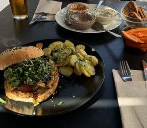 Burger siempre and mixed hummus/olive/tofu (I think!) dips   at La Camelia Vegan Bar in Bilbao