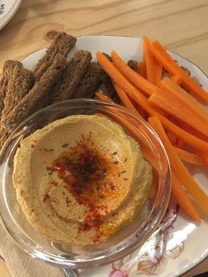Hummus, bread and carrots at La Camelia Vegan Bar in Bilbao