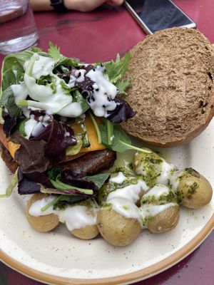 “La nueva” Burguer with extra potatoes at La Camelia Vegan Bar in Bilbao