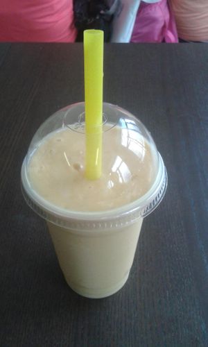 Mango smoothie with quinoa milk at Natural Plus in Outlying Islands
