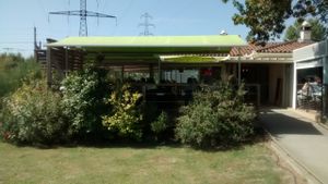 In front of the terrace at La Faim des Haricots in Labege