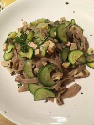 Whole wheat tagliatelle with smoked tofu, courgettes, and ginger  at Nadamas in Bolzano