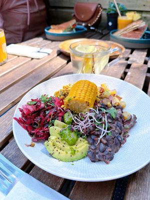 Spicy Mexican Bowl - bittersweet purple cabbage, scrambled tofu, black beans stew, raw salad, sprouts, roasted white potato, avocado and pesto.  at FOAM in The Hague