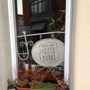 restaurant's sign in window  at Pasta Madre in Grosseto