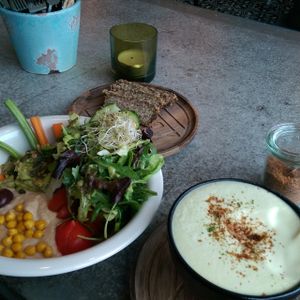 Matcha latte with almond milk and coconut sugar, and the savory breakfast bowl at The Bowl - Warschauer Str in Berlin
