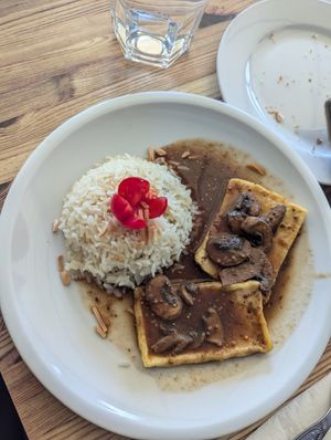 Tofu with mushroom sauce and rice at Bar do Girassol in Amarante