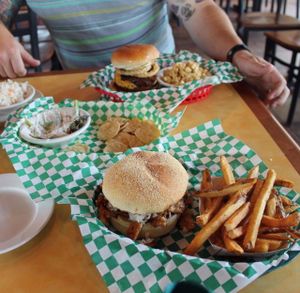 BBq sandwich and fries, crabby dip, Burger with mac and cheese and cole slaw. all good! at Bean Vegan Cuisine in Asheville