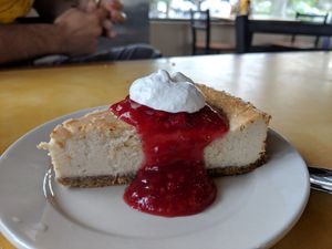 Vanilla cheesecake with raspberry compote and whipped cream at Bean Vegan Cuisine in Asheville