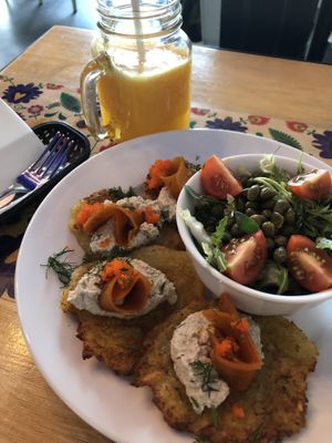 Potato pancakes and fresh orange juice at Vege Bistro - Polish Vegan Food in Warsaw
