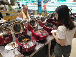personal rice cookers at Yuan Tong Vegetarian - Plum Garden in Shenzhen