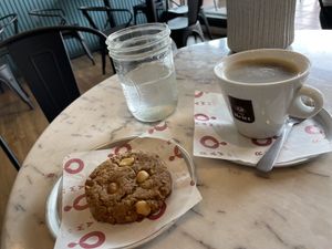 Macadamia nut cookie with a coffee  at Raw Co. Juicery and Food in Escazu